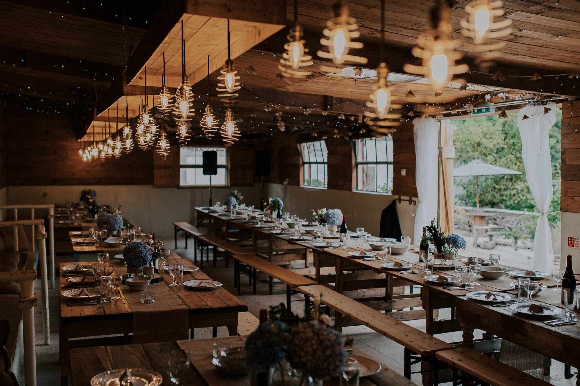 The Old Milking Parlour decorated for a rustic wedding reception